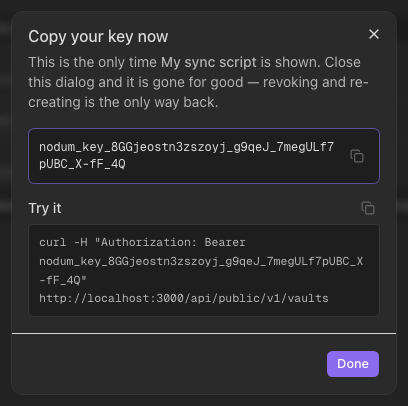 The new key, shown exactly once, with its ready-made curl.